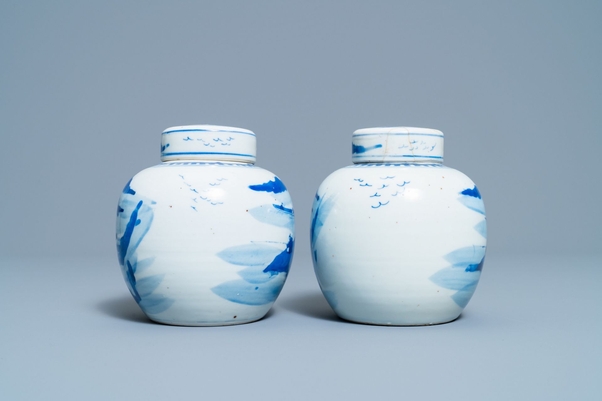 A pair of Chinese blue and white covered jars and a pair of famille rose vases, 19th C. - Image 10 of 13