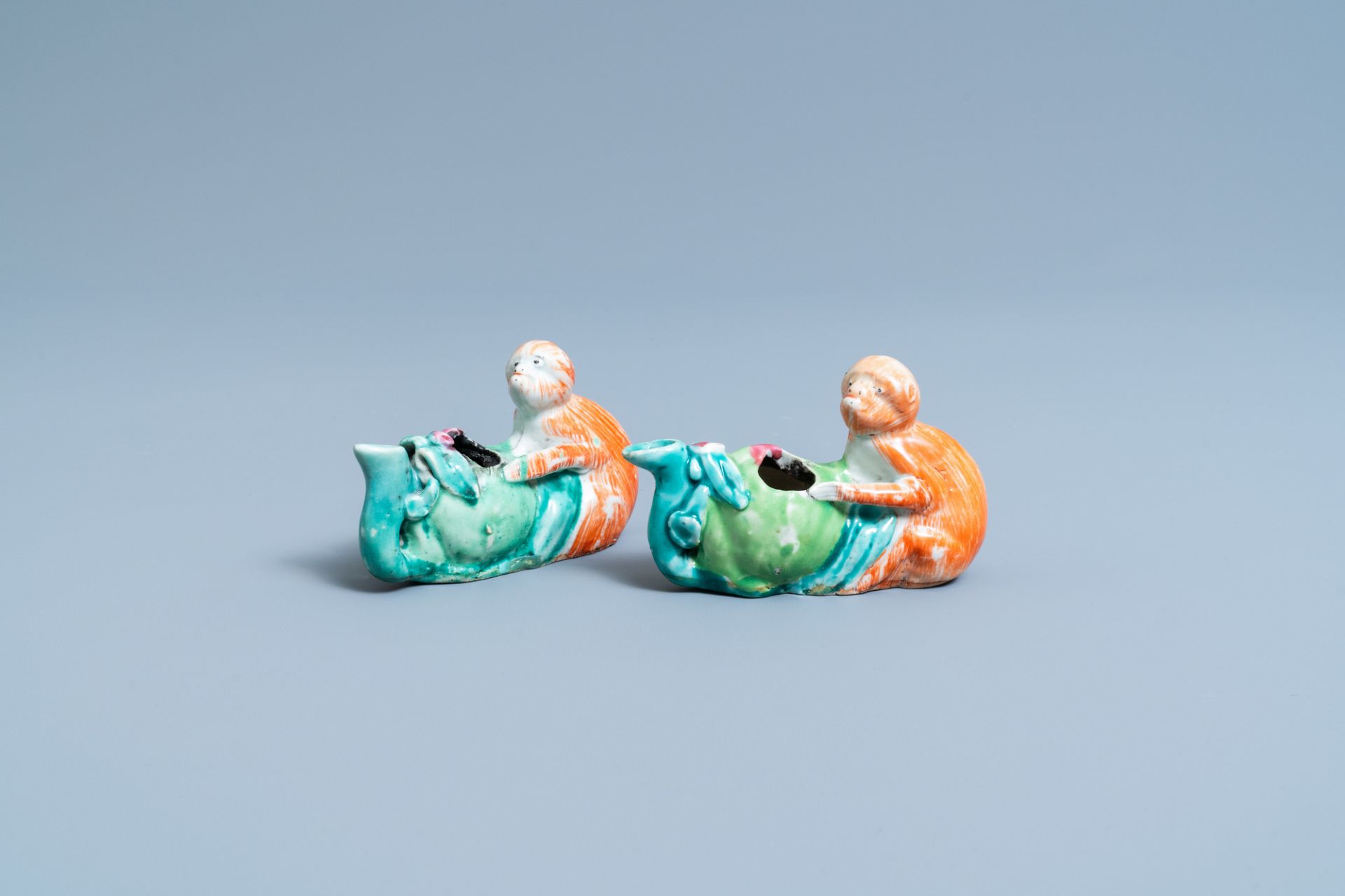 A pair of Chinese famille rose 'monkey and peach' water droppers, 19th C.