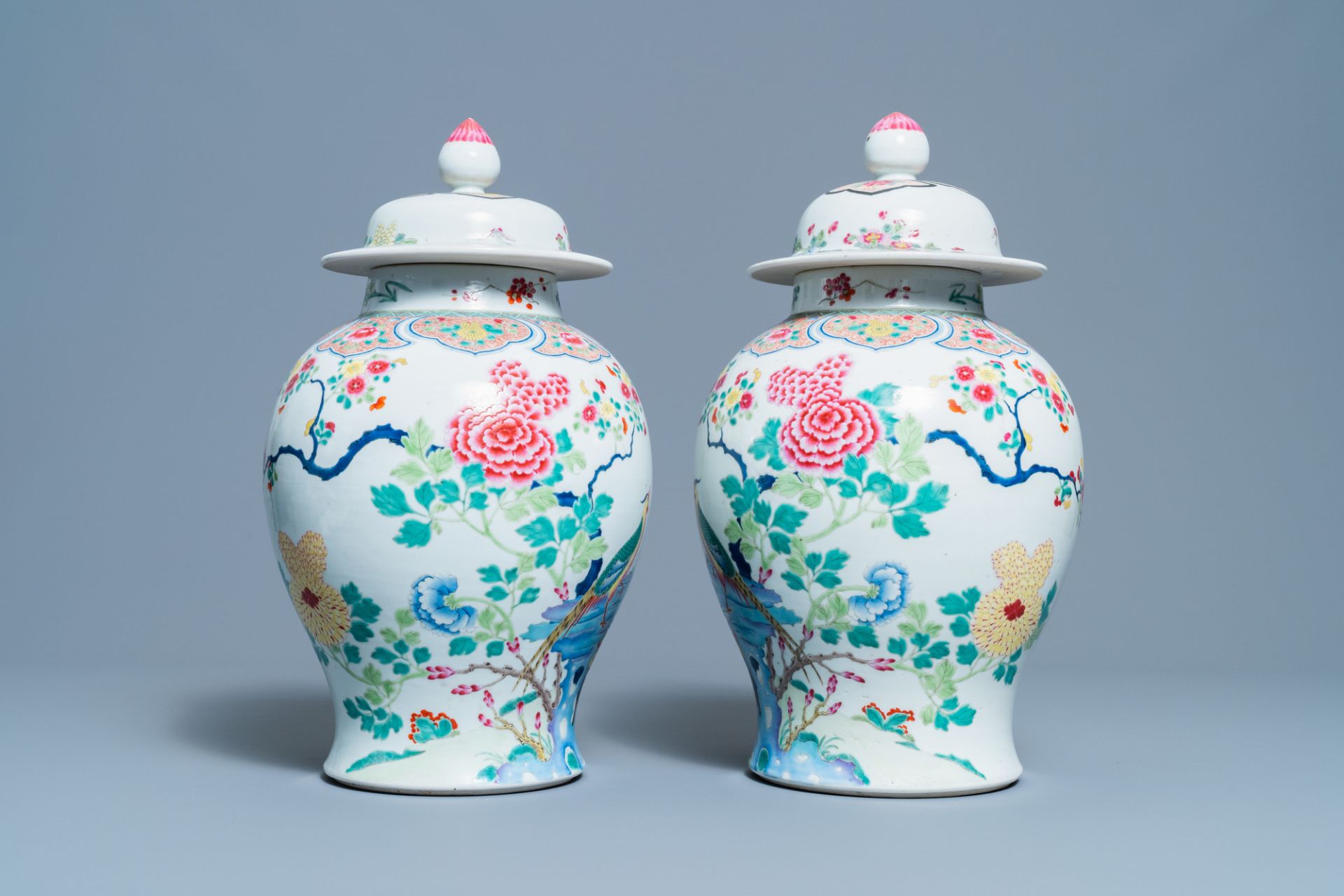 A pair of Chinese famille rose 'pheasants' vases and covers, 19th C. - Image 4 of 6