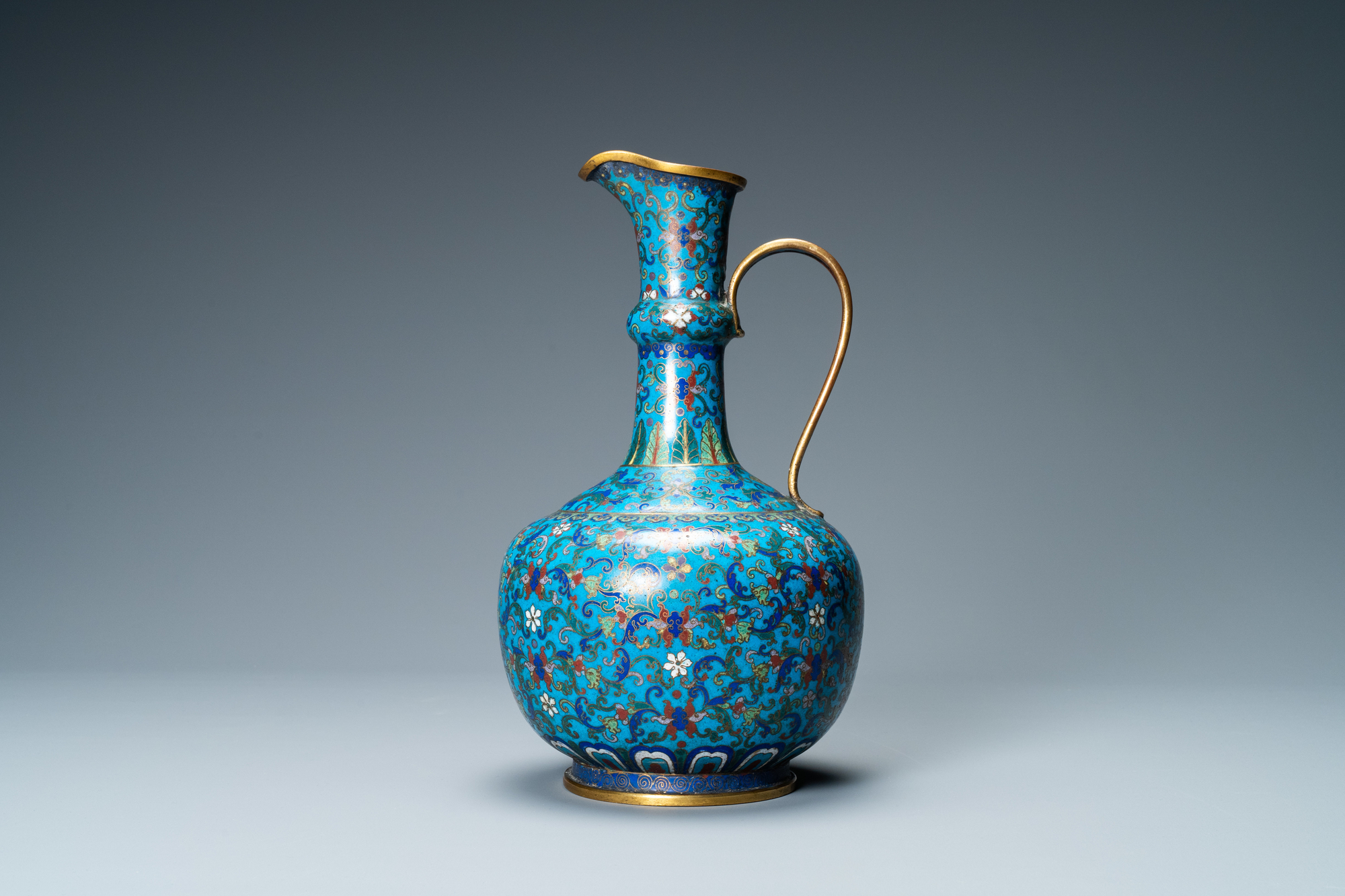 A Chinese cloisonne 'floral scroll' water jug, 18/19th C.
