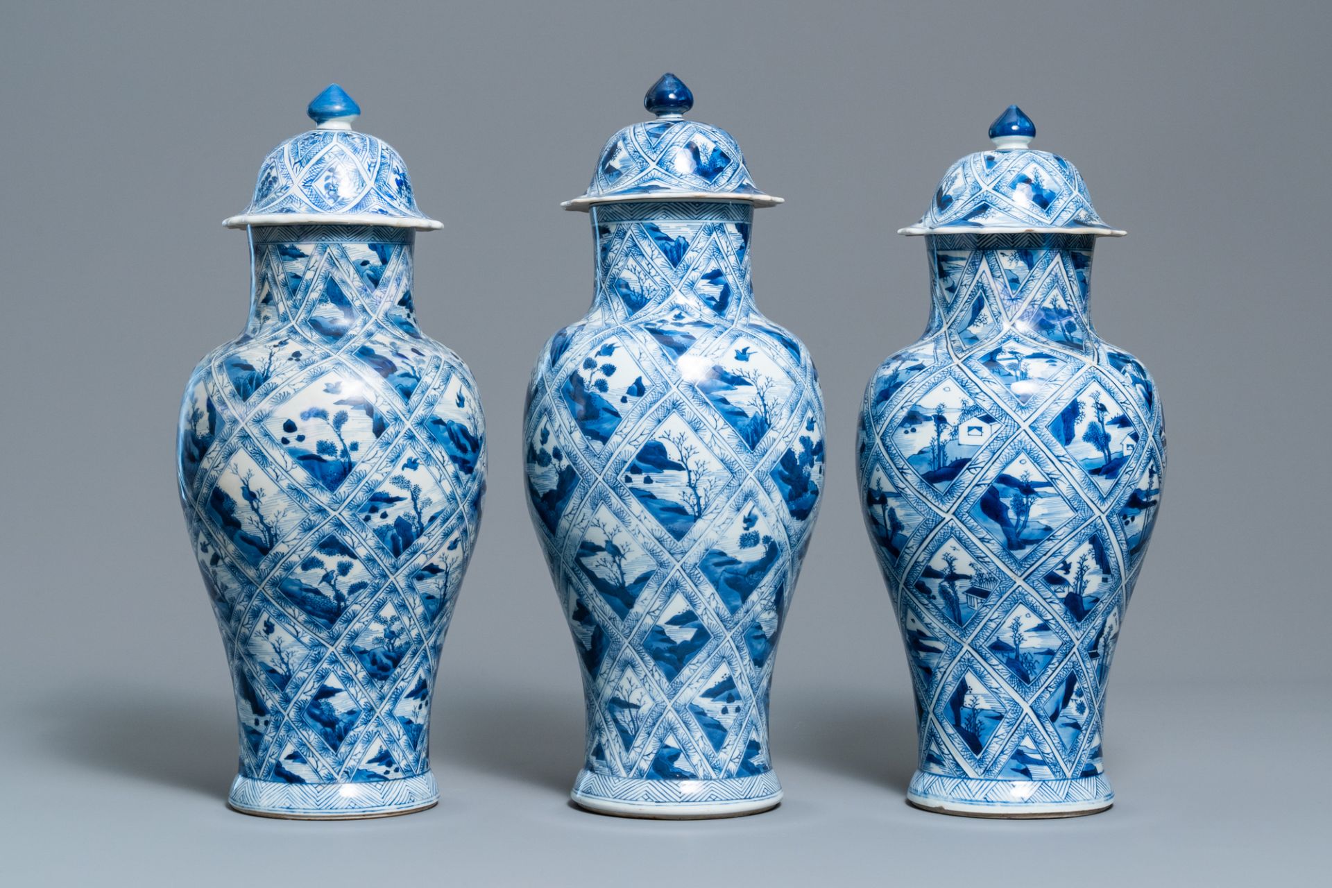 A large Chinese blue and white five-piece garniture with floral and landscape panels, Kangxi - Image 3 of 66