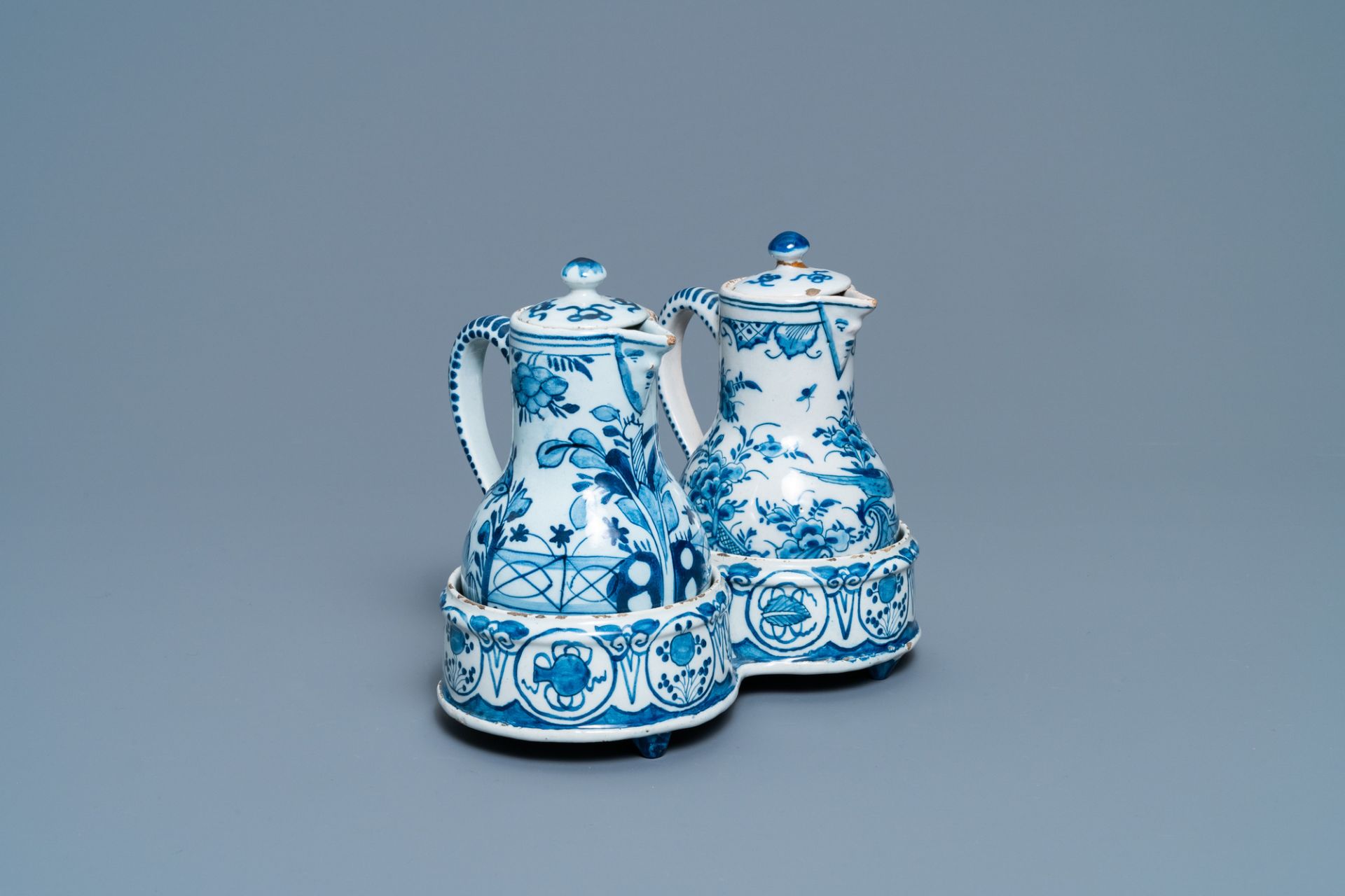 A Dutch Delft blue and white cruet set on stand, 2nd quarter 18th C.