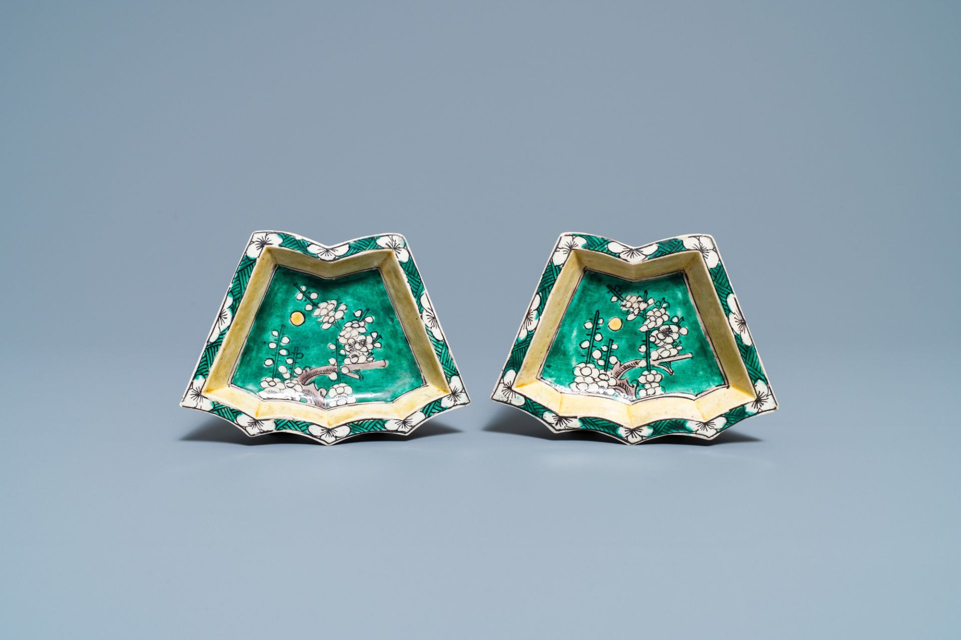 A pair of Chinese verte biscuit sweetmeat dishes, Kangxi