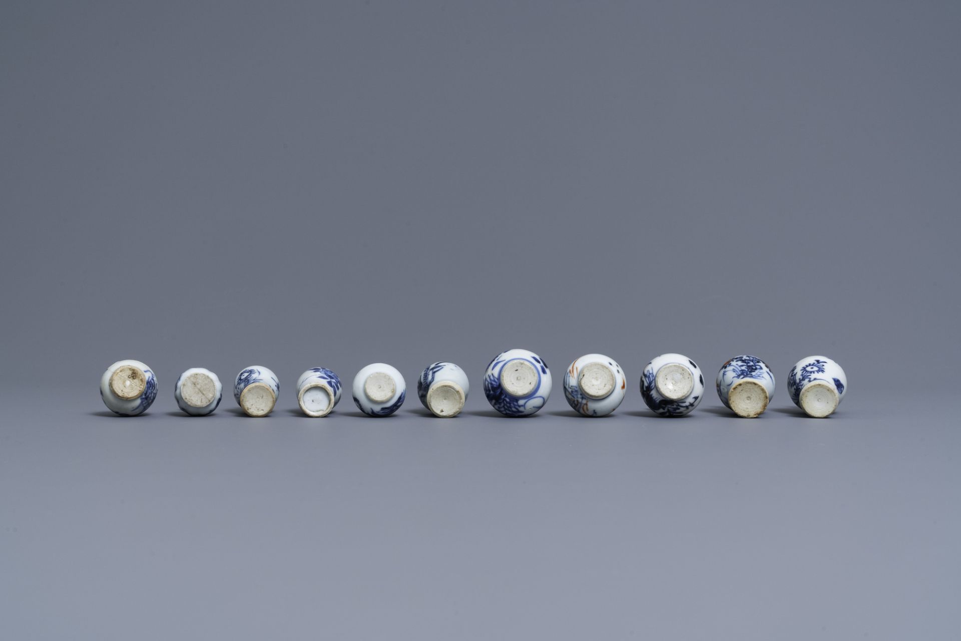 Six Chinese blue and white cups and saucers and eleven miniature vases, Kangxi - Image 6 of 17