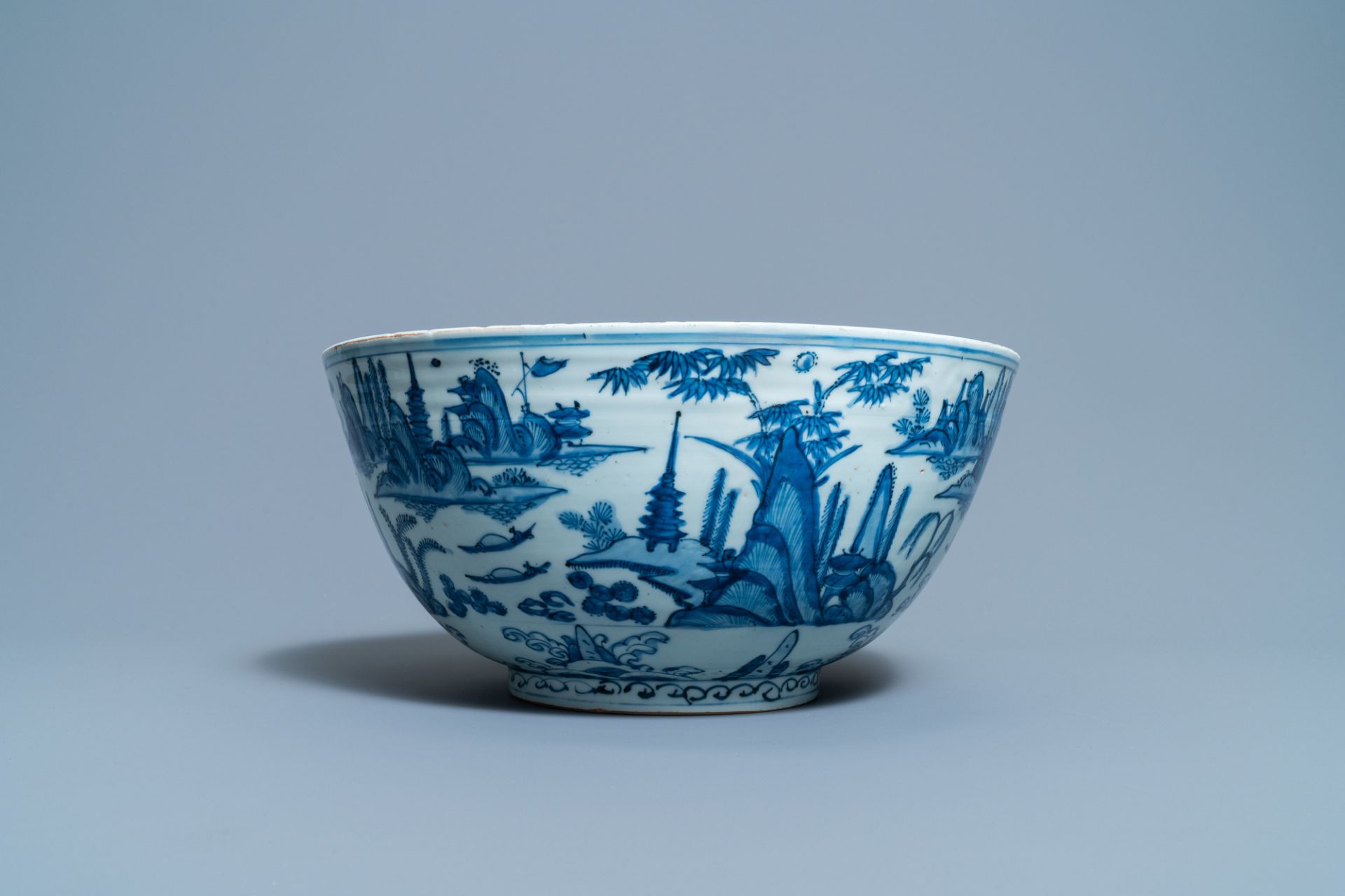 A large Chinese blue and white 'river landscape' bowl, Ming - Image 4 of 13