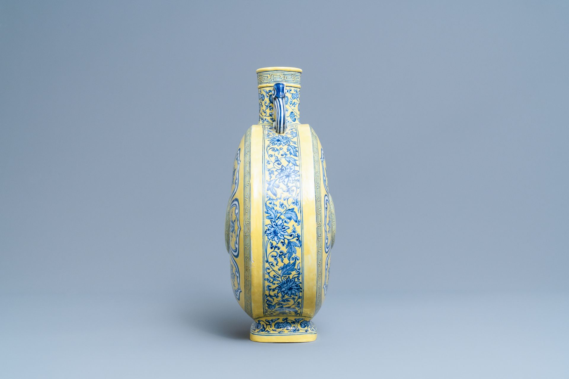 A Chinese yellow-ground blue and white 'Bajixiang' moonflask vase, Yongzheng mark, 19/20th C. - Image 2 of 20