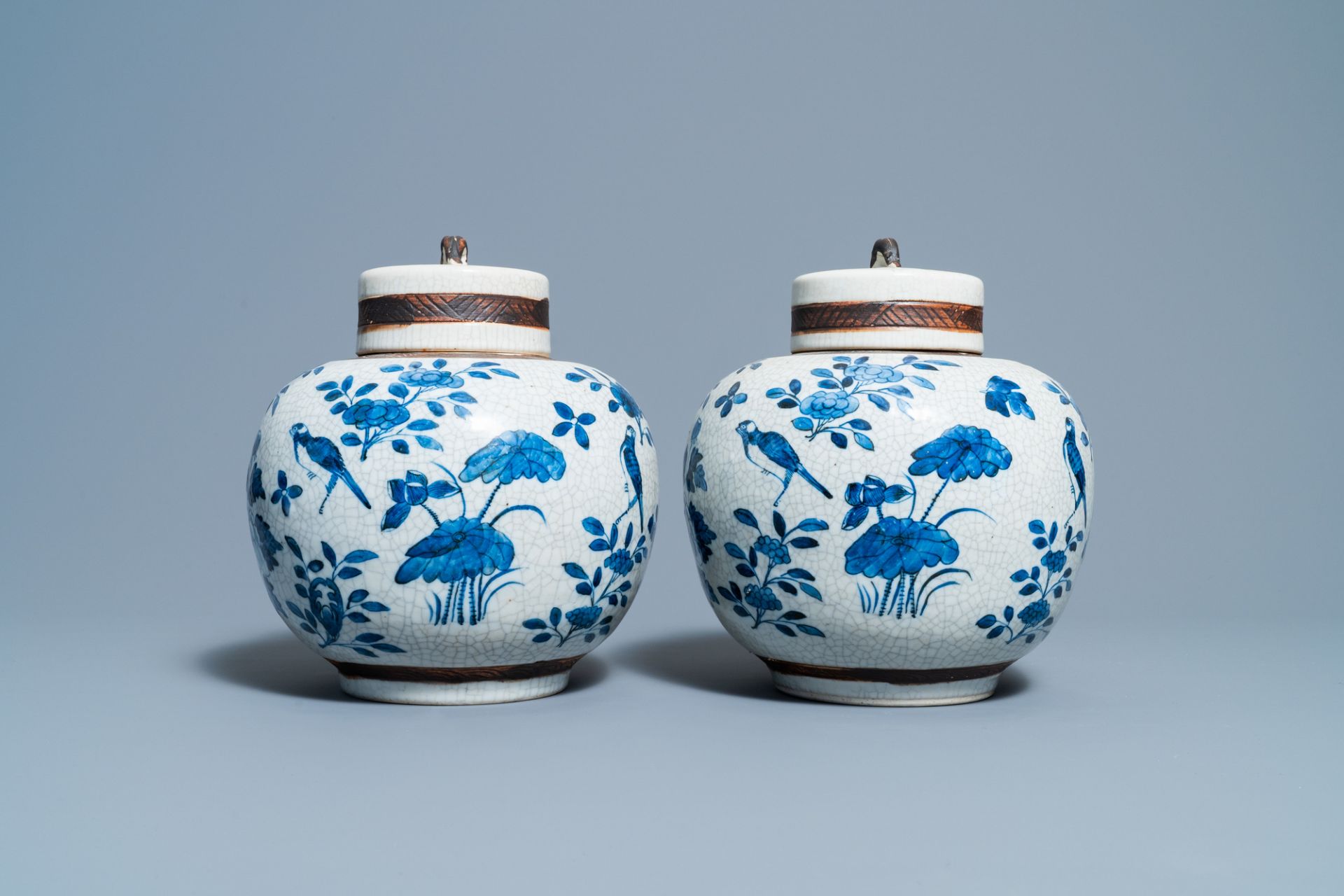 A pair of Chinese blue and white Nanking crackle-glazed jars and covers, 19th C. - Image 2 of 6