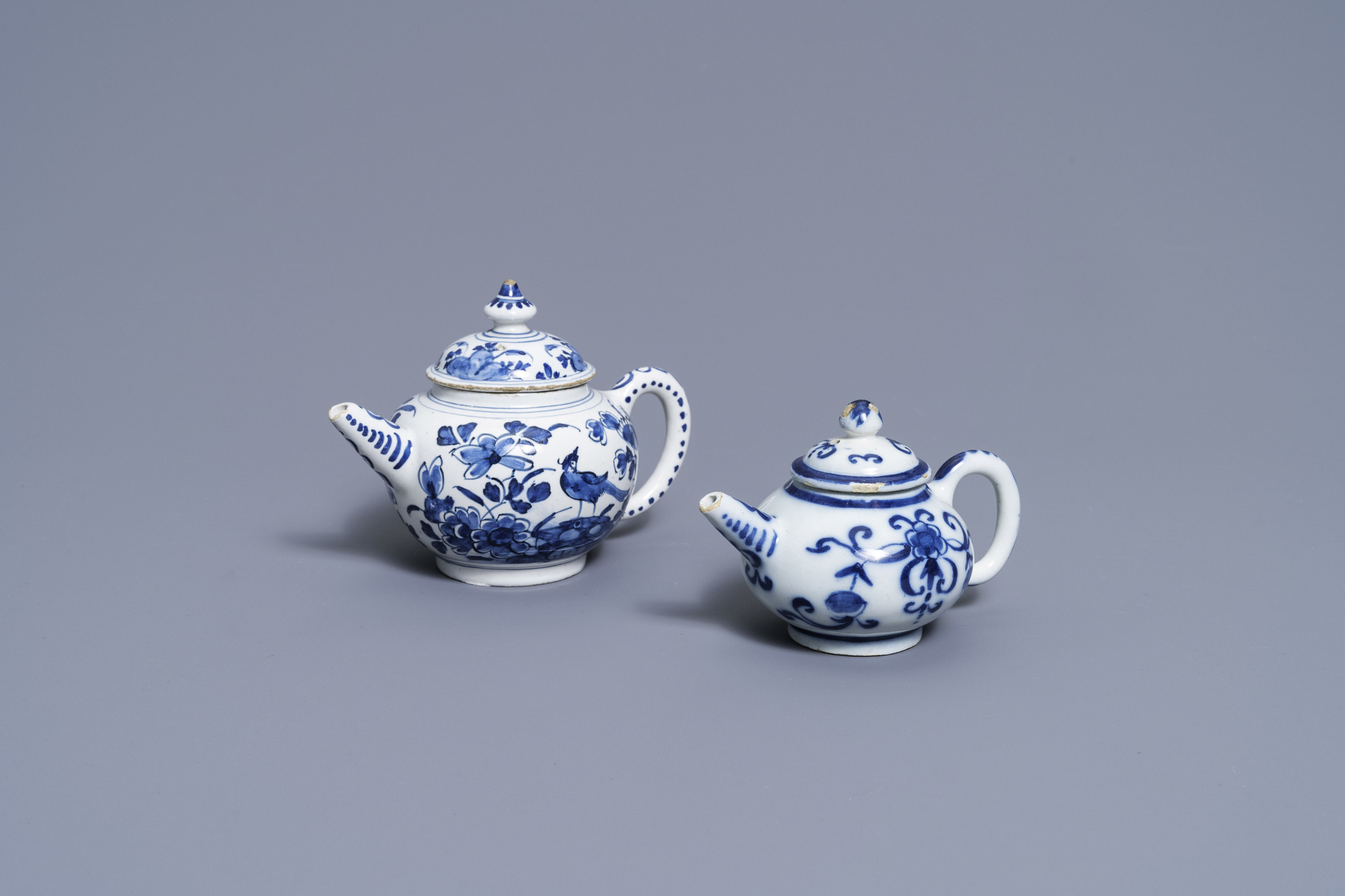 Two Dutch Delft blue and white teapots and covers, 18th C.