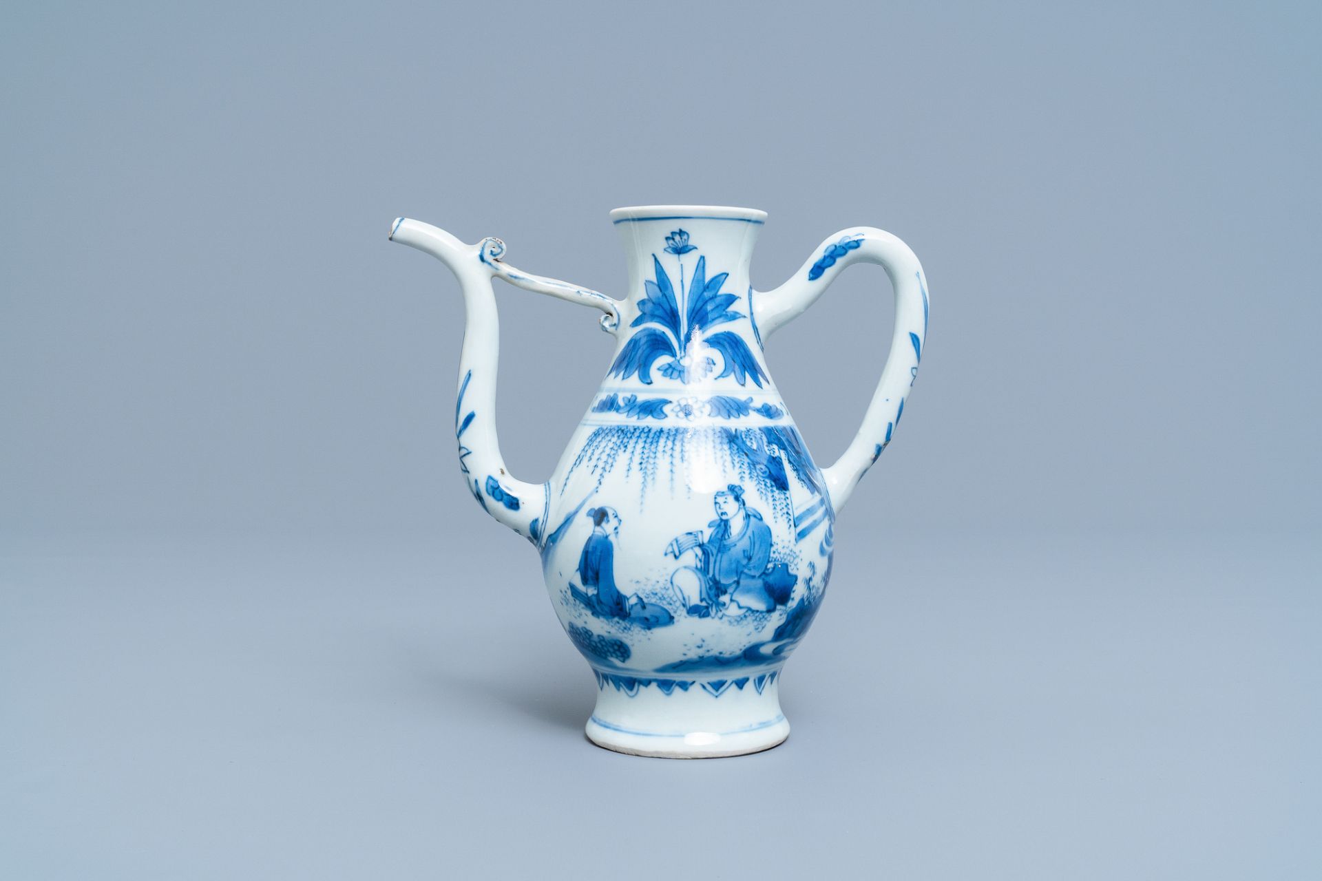 A Chinese blue and white ewer with figures in a landscape, Transitional period - Image 2 of 10