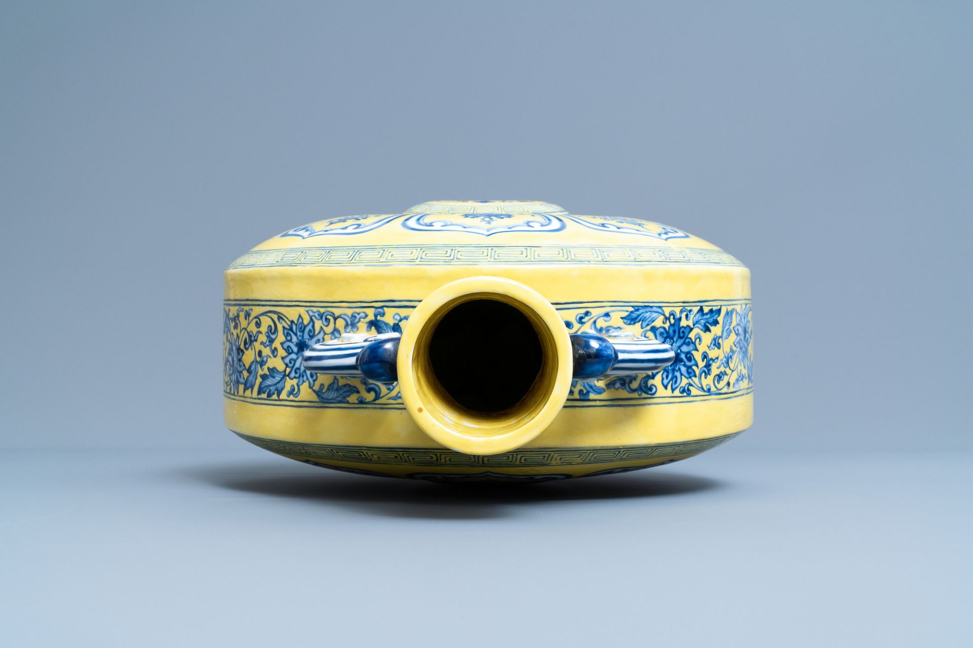 A Chinese yellow-ground blue and white 'Bajixiang' moonflask vase, Yongzheng mark, 19/20th C. - Image 5 of 20