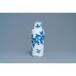 A Chinese blue and white rouleau vase with floral design, Kangxi