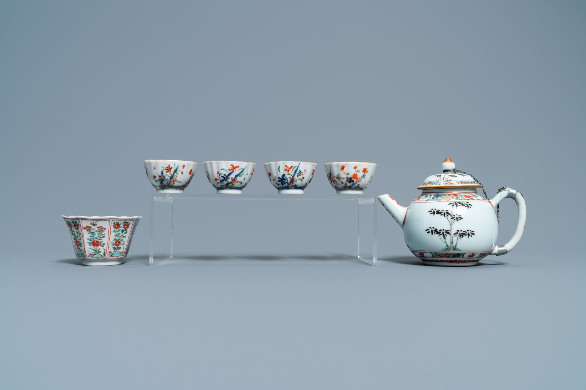 A Chinese famille verte teapot, seven saucers and five cups, Kangxi - Image 4 of 9