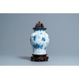 A Chinese blue and white vase with birds among blossoms, Transitional period