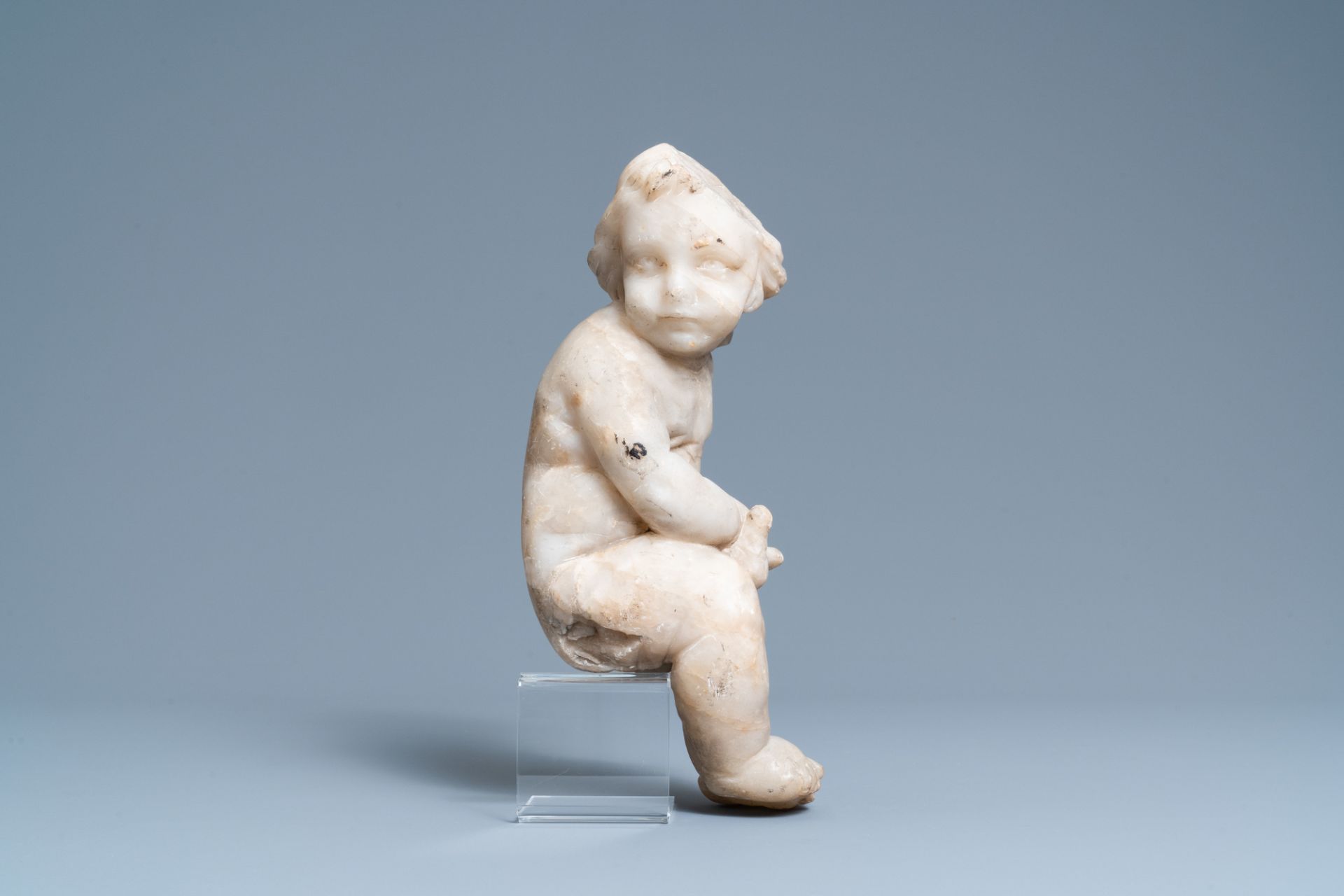 An alabaster figure of a putto with a bird on the knee, 17th C. - Image 3 of 8