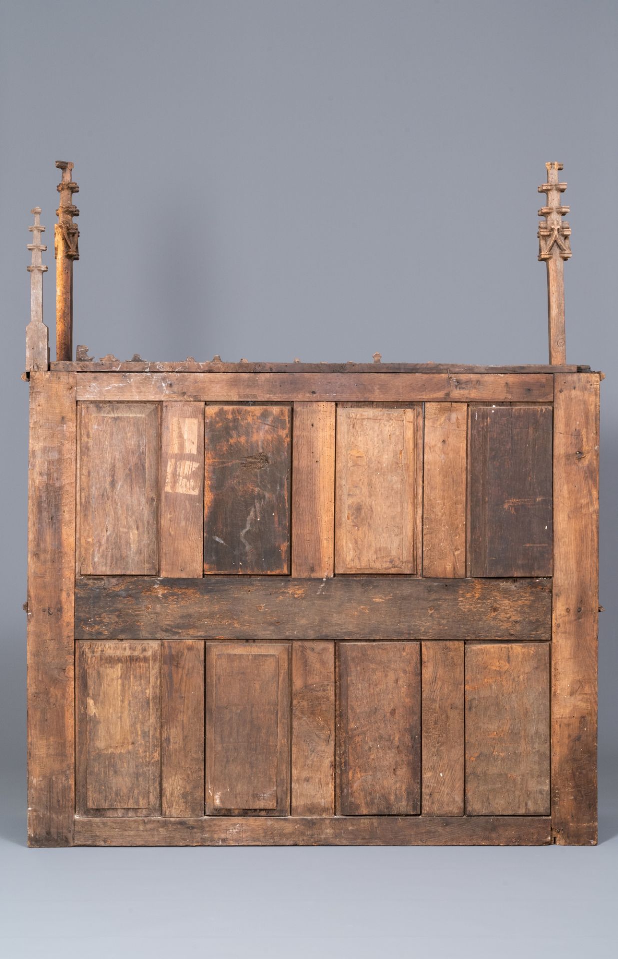 A carved oak shelf with pinnacles and stylised flowers and carved panels, 15th C. and later - Image 4 of 12