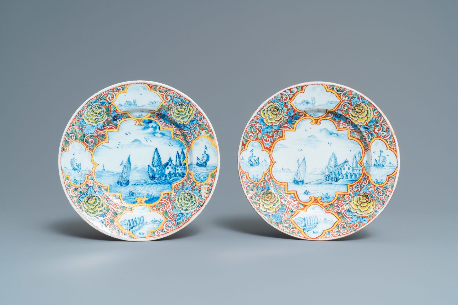 A pair of fine mixed technique Dutch Delft 'seaview' plates, 18th C.