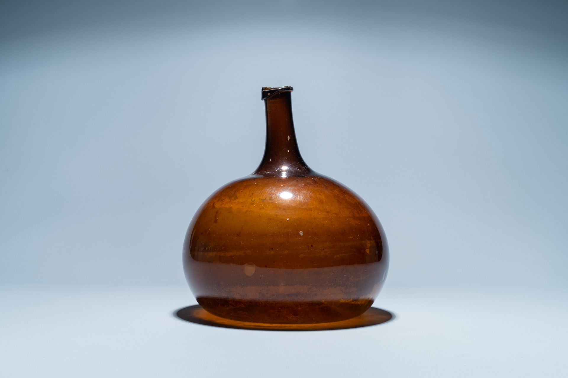 A brown glass bottle, 18th C. - Image 2 of 6