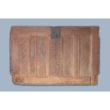 A carved oak front panel of a coffer with tracery panels and geometrical motives, Brittany, France,