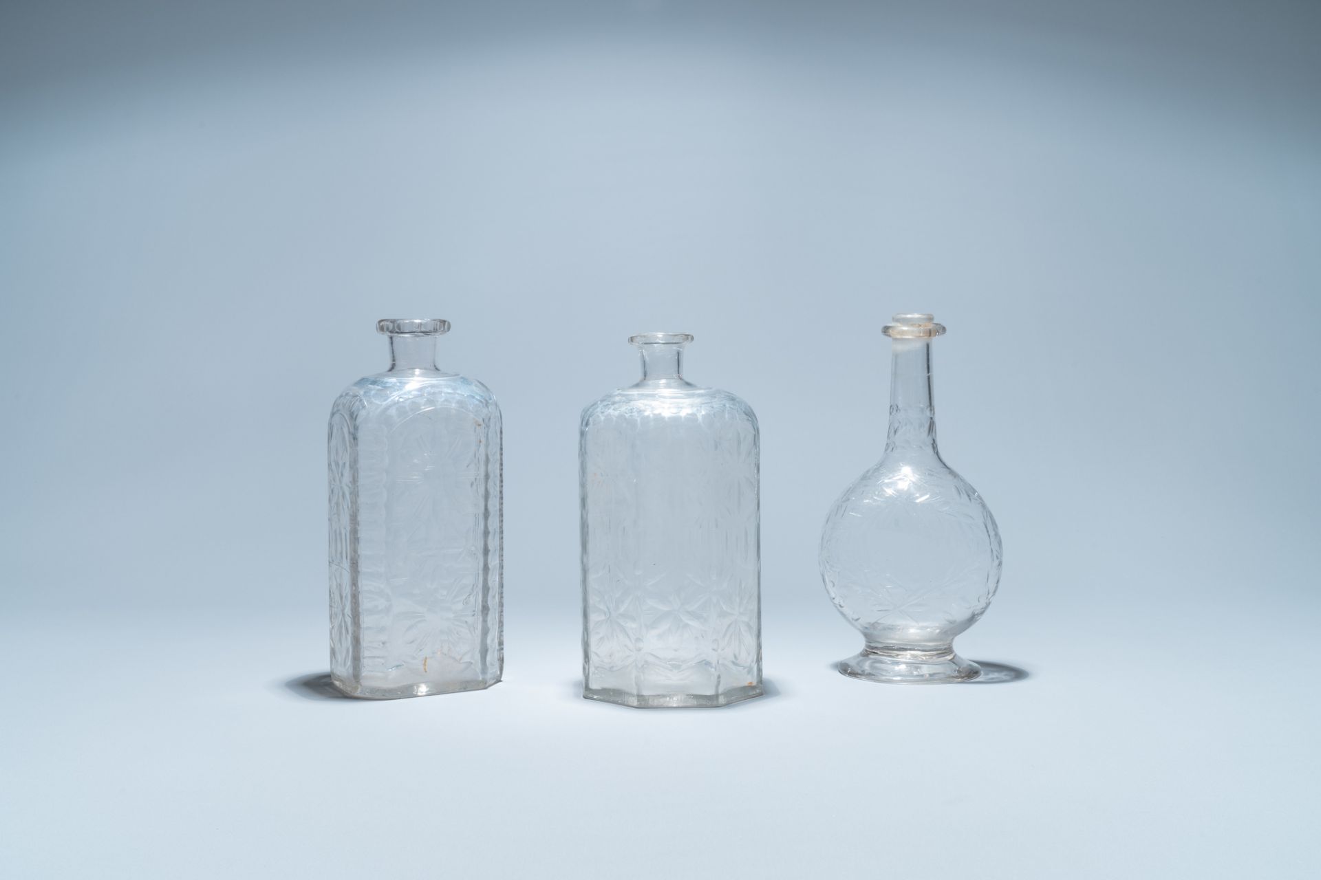 Three weel-cut glass bottles, probably Liege, 18/19th C.