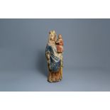 A large polychromed limestone figure of a Madonna with child, Champagne or Lorraine province, France