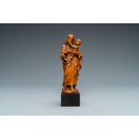 A boxwood figure of Joseph with child, Flanders, 17th C.