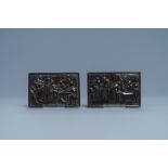 A pair of rectangular bronze plaques, 17th C.