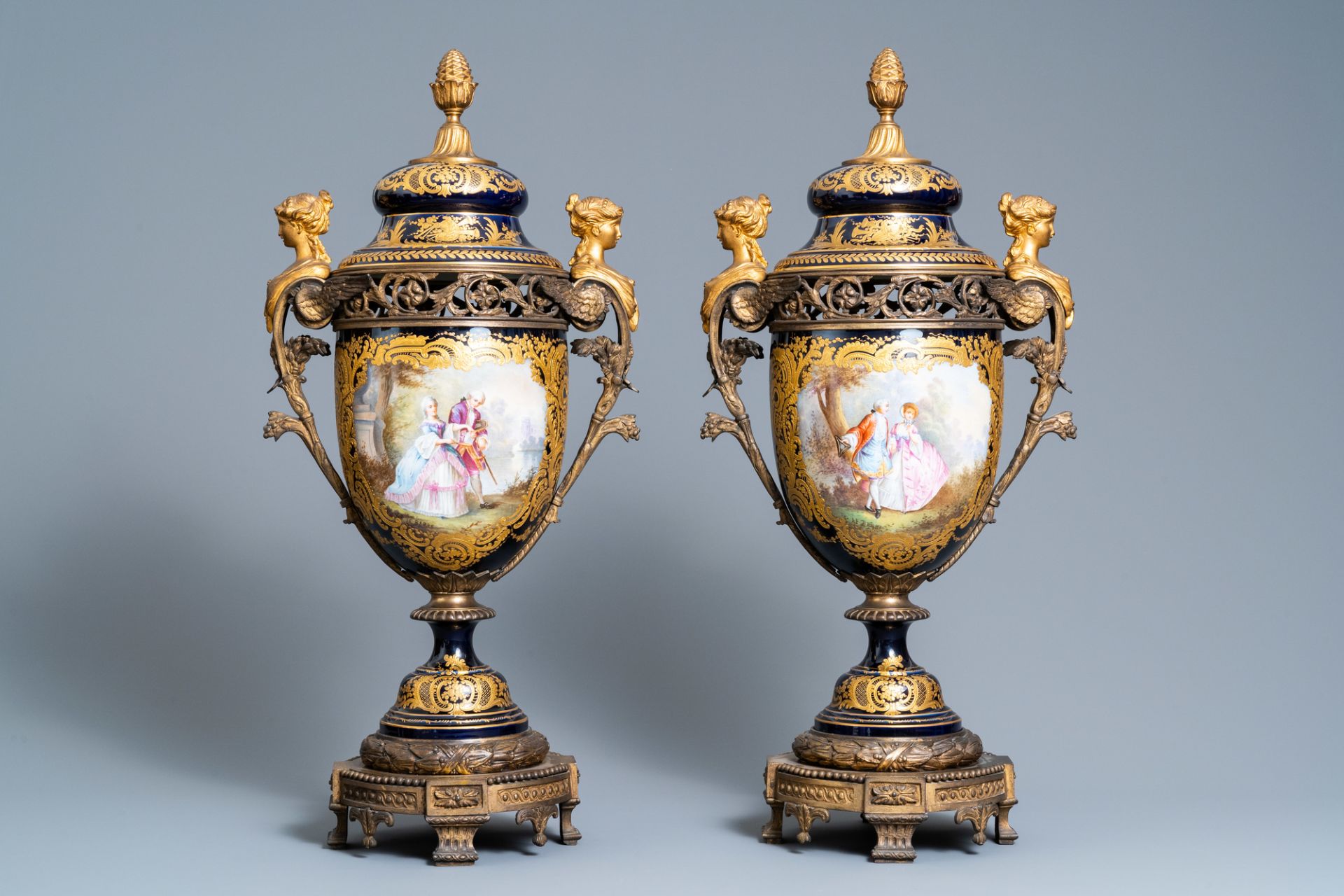 A pair of large French Svres-style vases with gilded bronze mounts, signed Le Berre, 19th C.