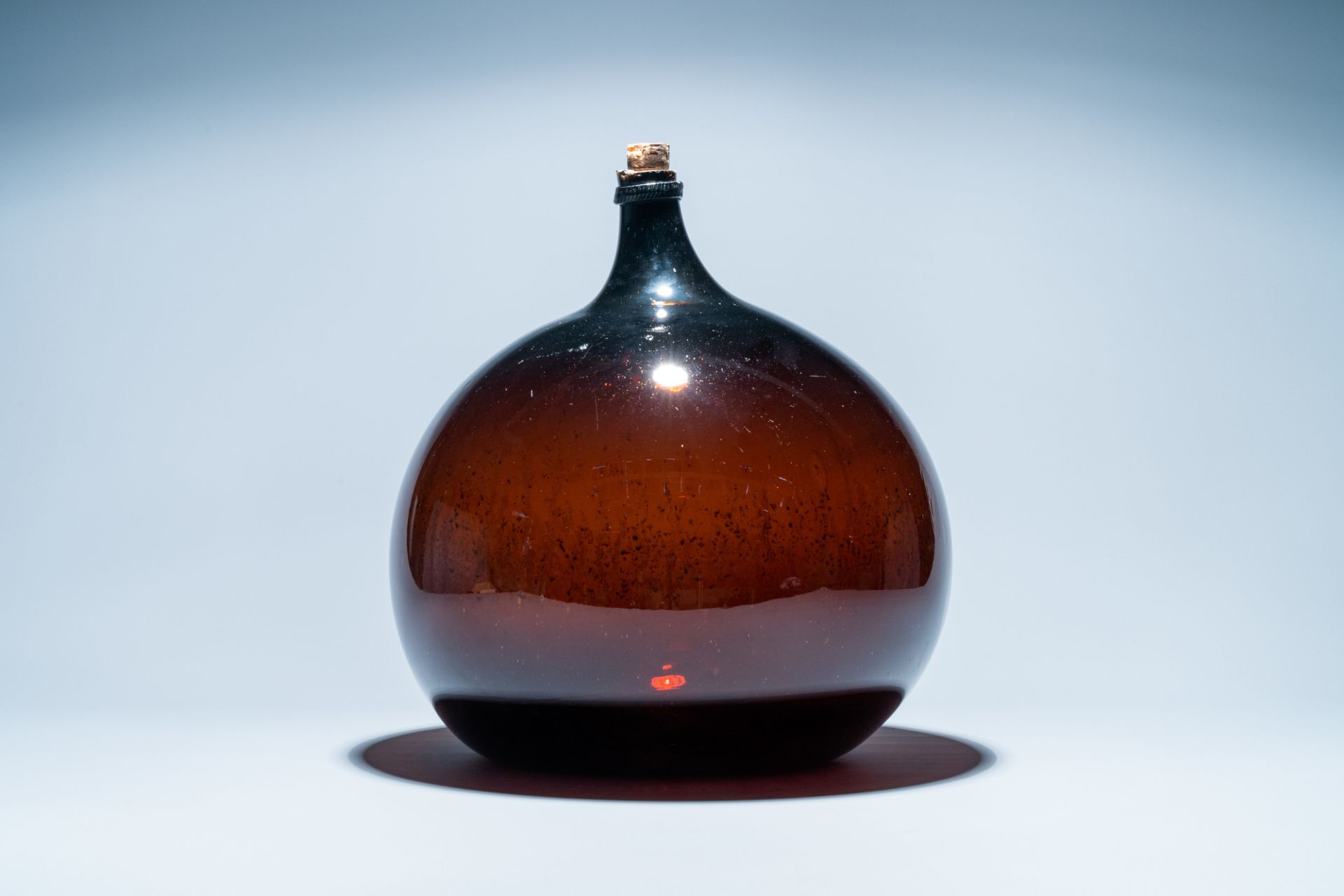 A large brown glass bottle, 18th C. - Image 2 of 6