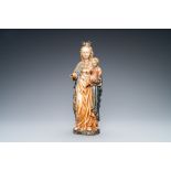 A polychromed and gilded walnut figure of a Madonna with child, so called 'PoupŽe de Malines', 1st h