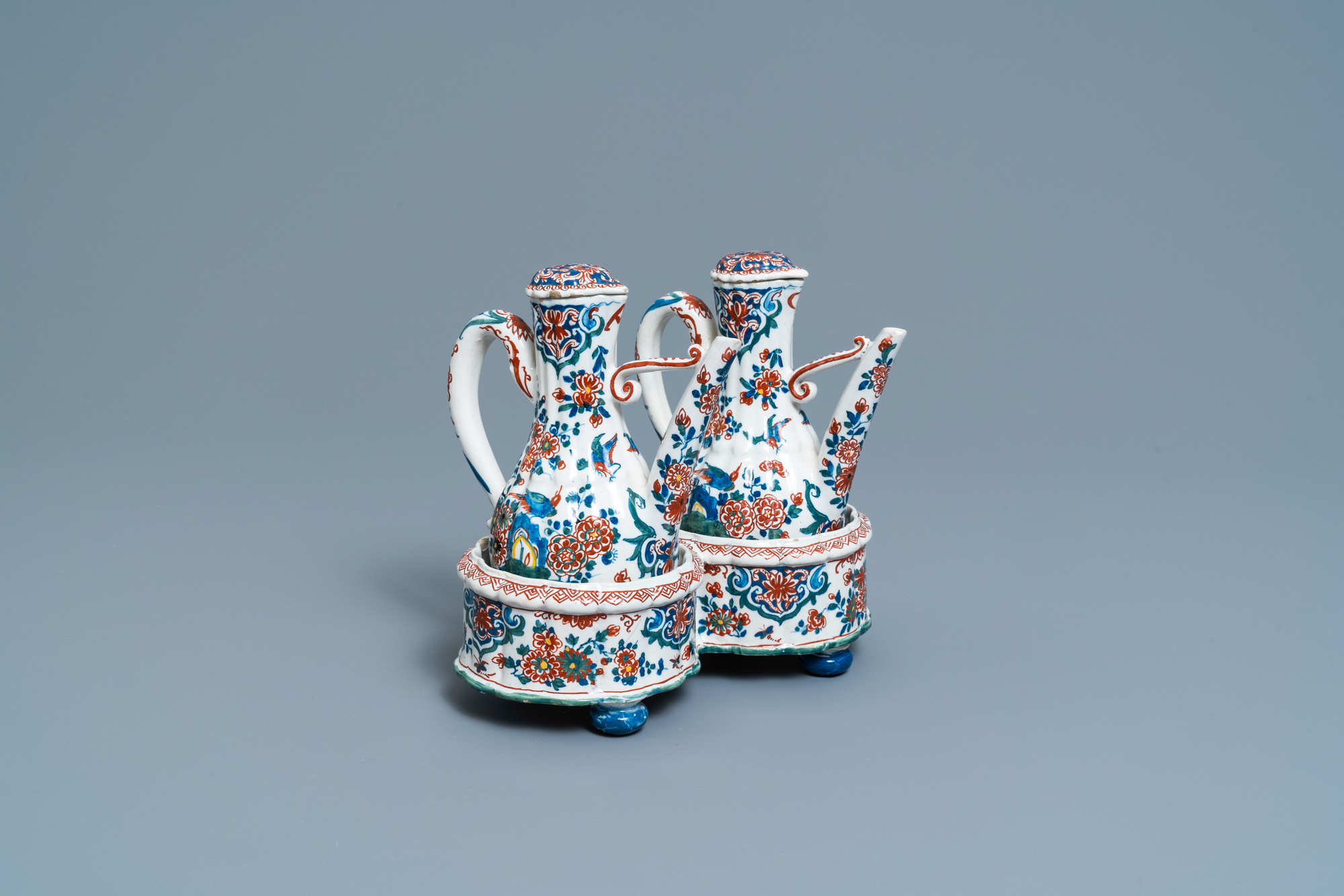 A Dutch Delft cashmere palette cruet set on stand, 1st quarter 18th C.