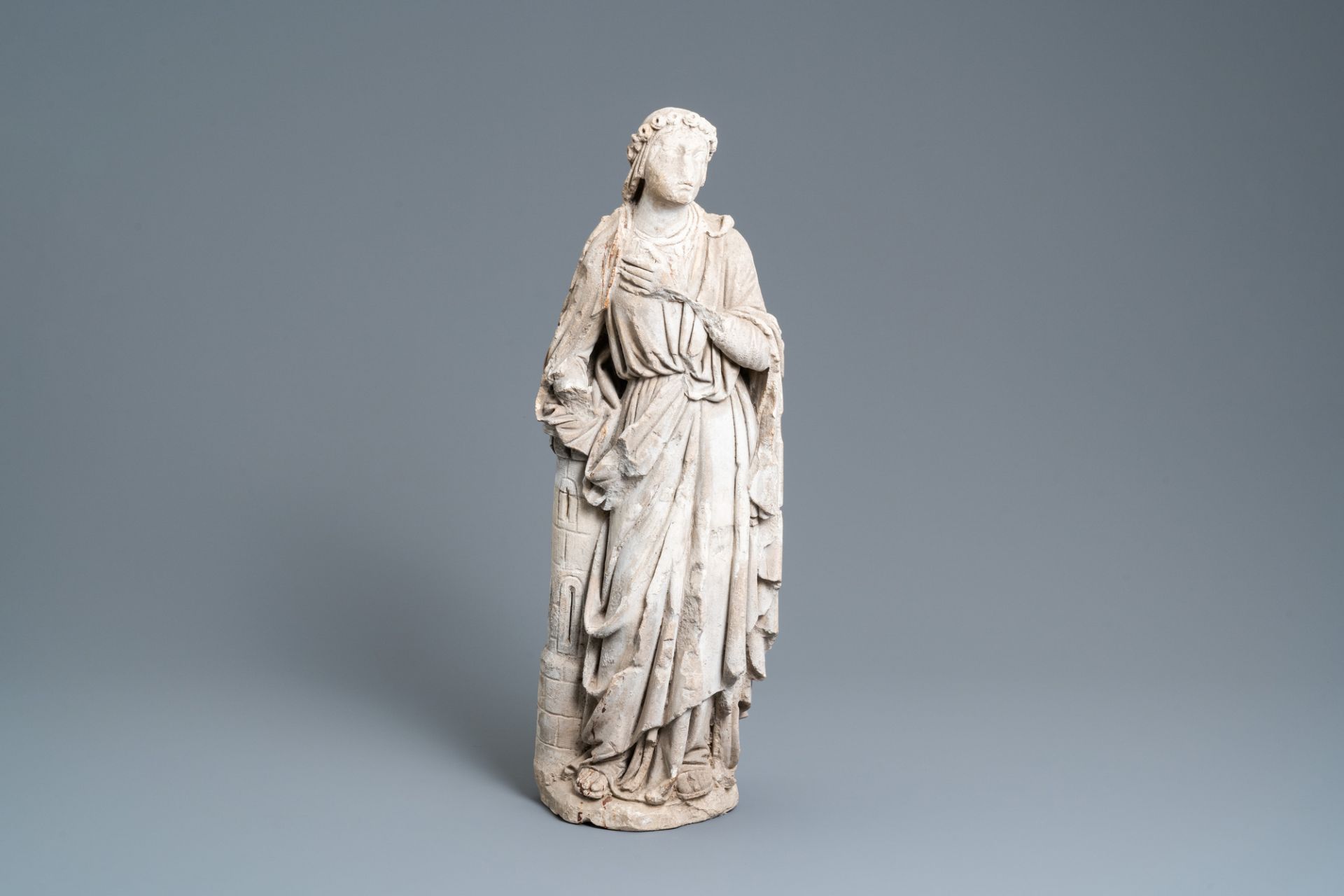 A limestone figure of Saint Barbara, 16th C.