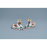 A pair of polychrome Dutch Delft models of cows, 18th C.