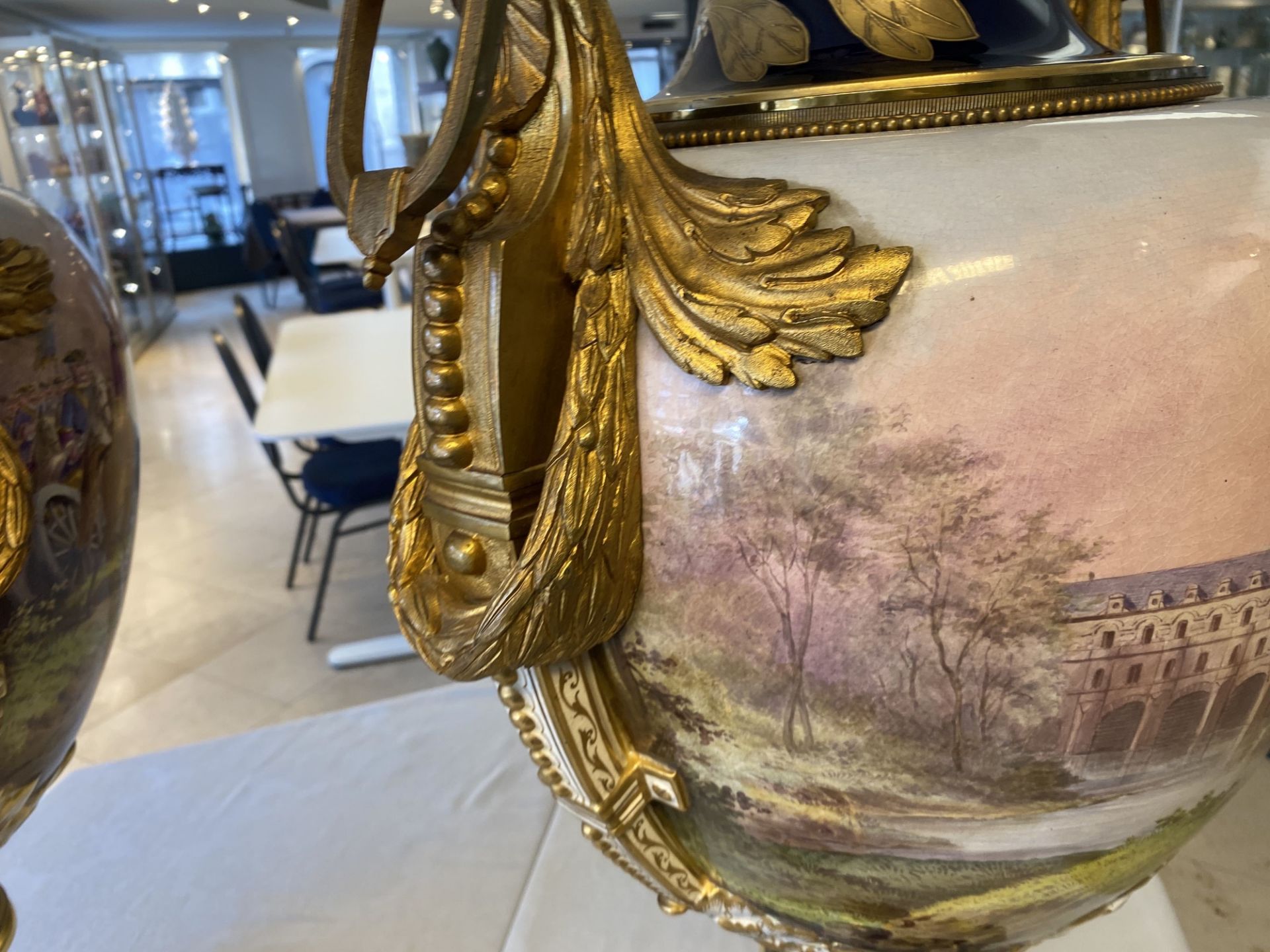 A pair of massive French Svres-style vases with gilded bronze mounts, signed Desprez, 19th C. - Image 42 of 56