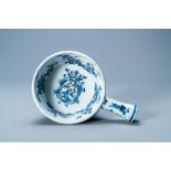 A rare Dutch Delft blue and white warming bowl with the arms of the Austrian von Zinzendorf family,