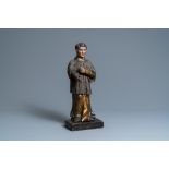 A polychromed and gilded wooden figure of Aloysius Gonzaga with glass eyes, Italy, 18th C.