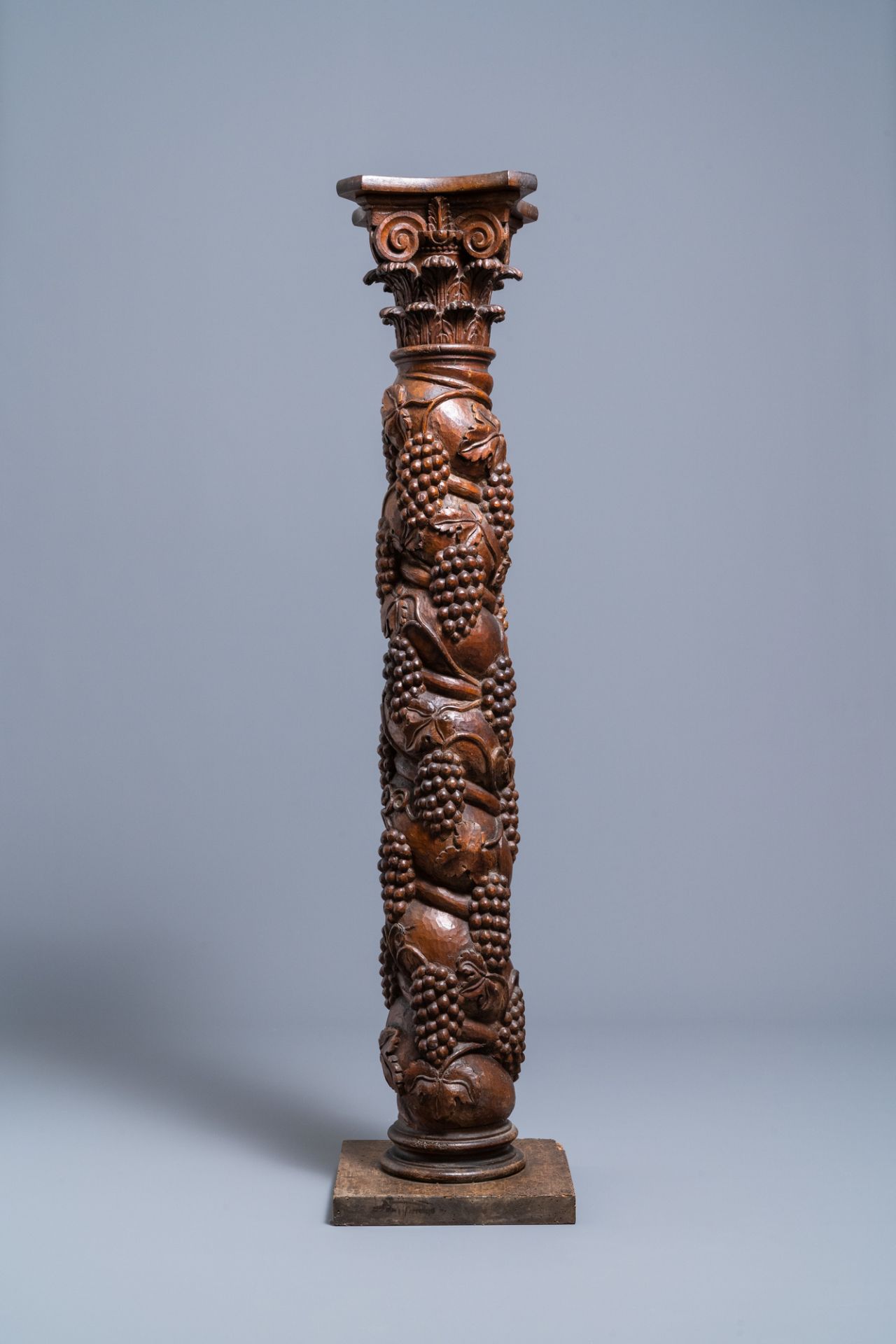 A carved walnut Ionic column with grapevines, 17th C. - Image 3 of 7