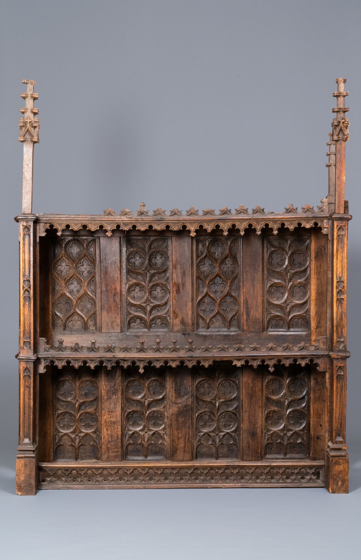 A carved oak shelf with pinnacles and stylised flowers and carved panels, 15th C. and later - Image 3 of 12