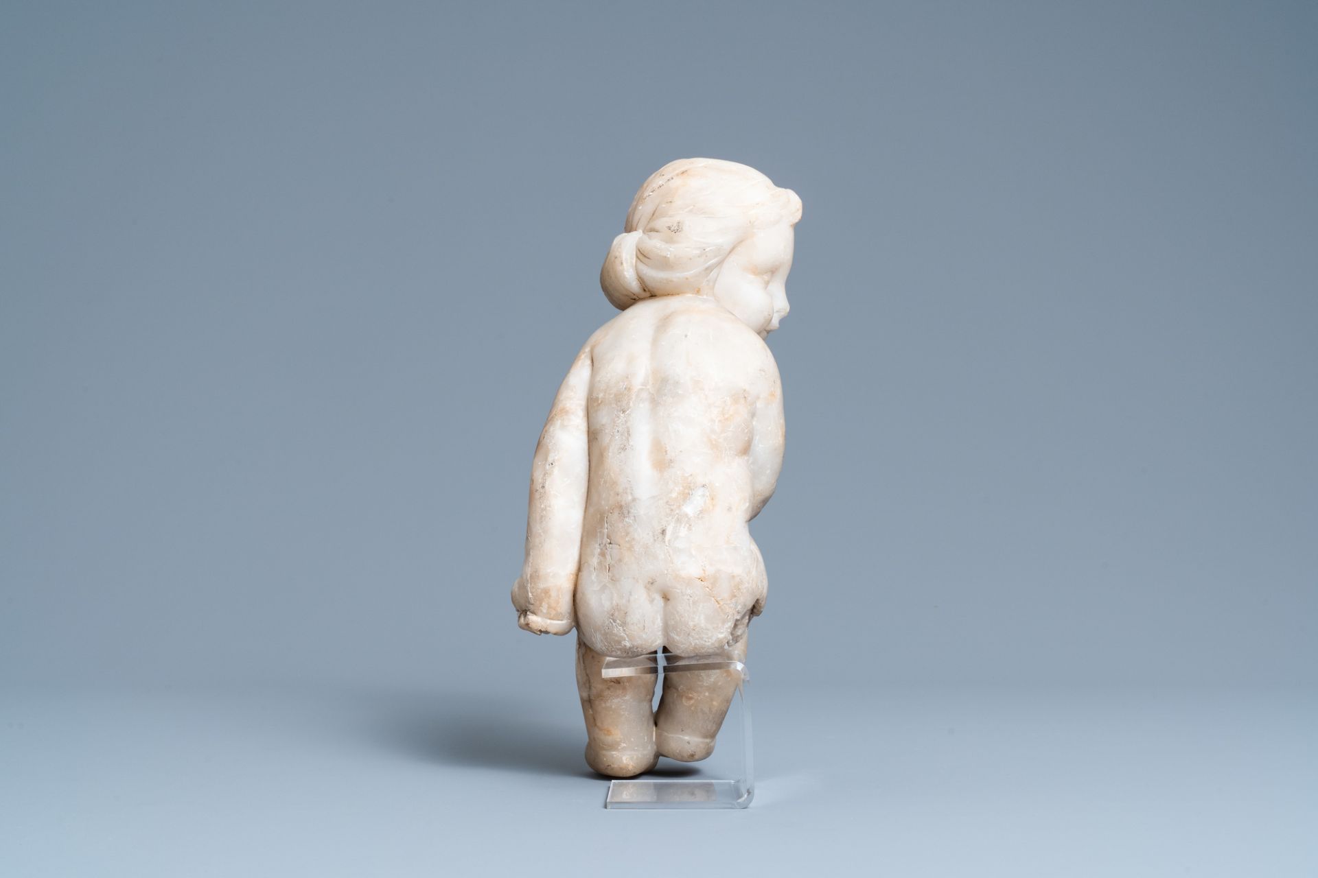 An alabaster figure of a putto with a bird on the knee, 17th C. - Image 6 of 8