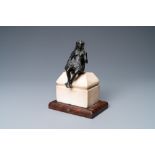 A black-patinated bronze figure of a young lady wearing a loincloth mounted on a marble base, Italy,