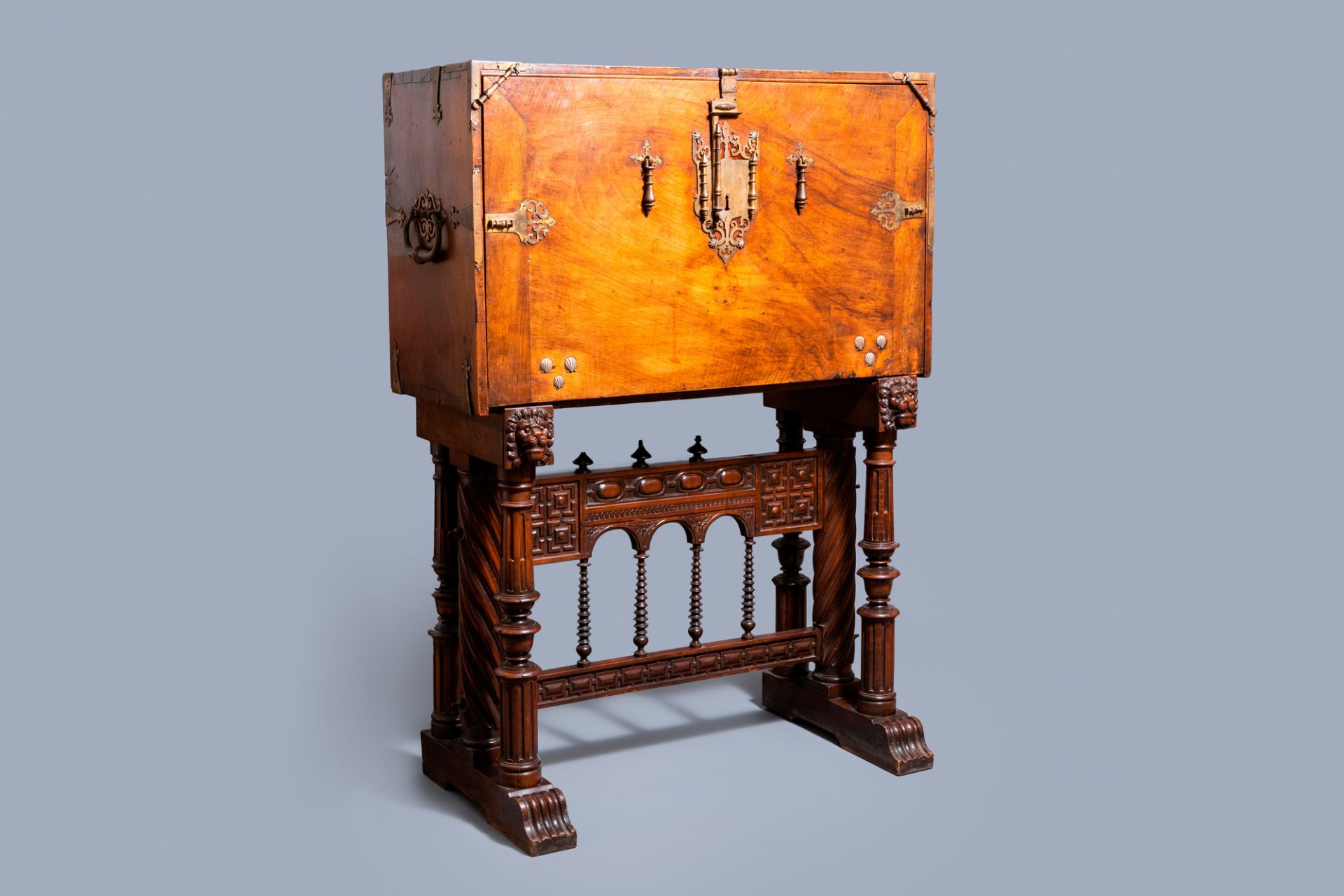 A Spanish bronze-mounted oak 'bargue–o' or cabinet on stand, 16th C.