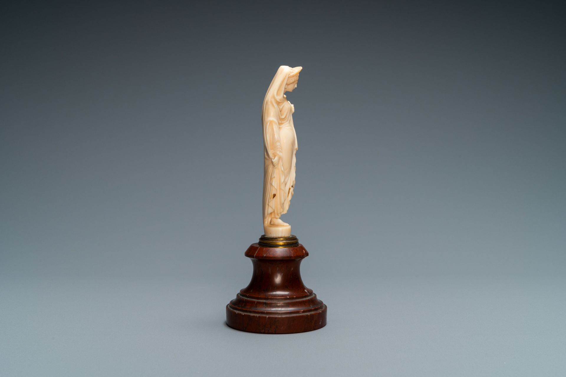 An ivory figure of a woman dressed after the antique holding a vase, probably Dieppe, France, 19th C - Image 6 of 8