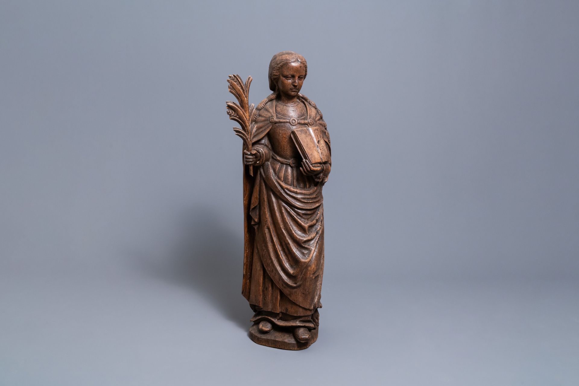 A large oak figure of Saint-Ursula the martyr, 1st half 16th C.