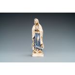 A polychromed and gilded ivory figure of a Madonna, 19th C.