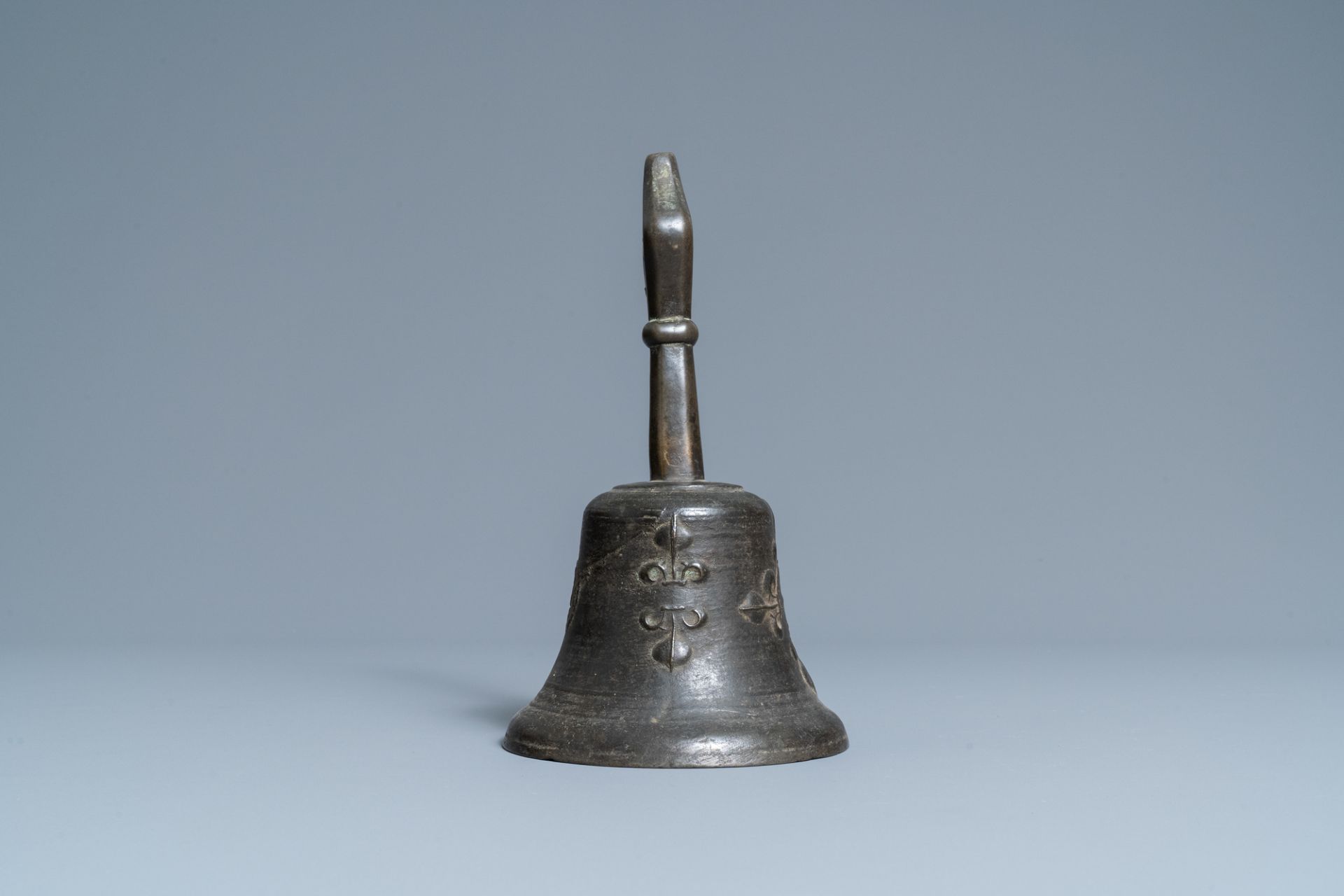 A bronze bell with applied fleur-de-lis and an IHS medallion, France, 16th C. - Image 3 of 7