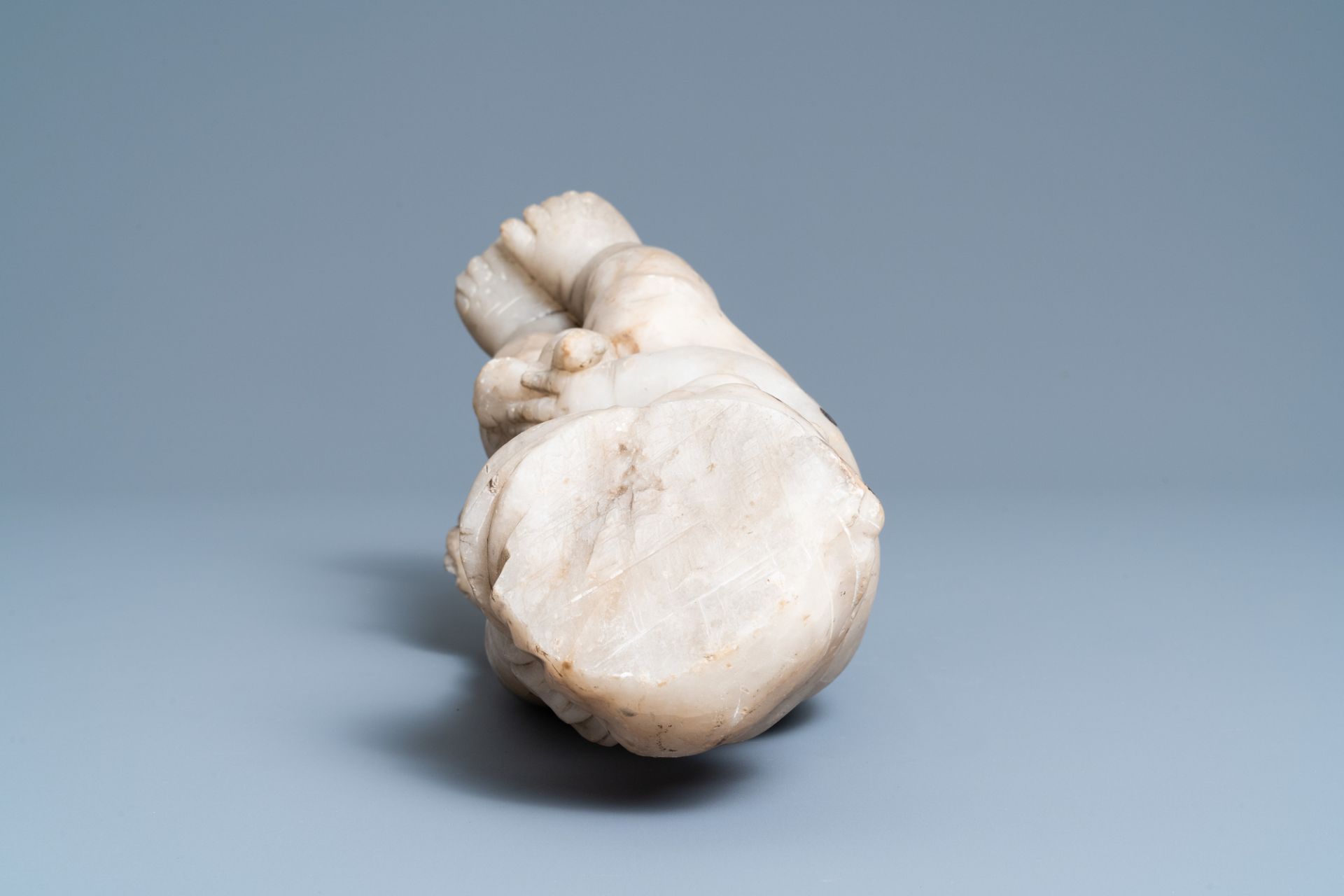 An alabaster figure of a putto with a bird on the knee, 17th C. - Image 7 of 8