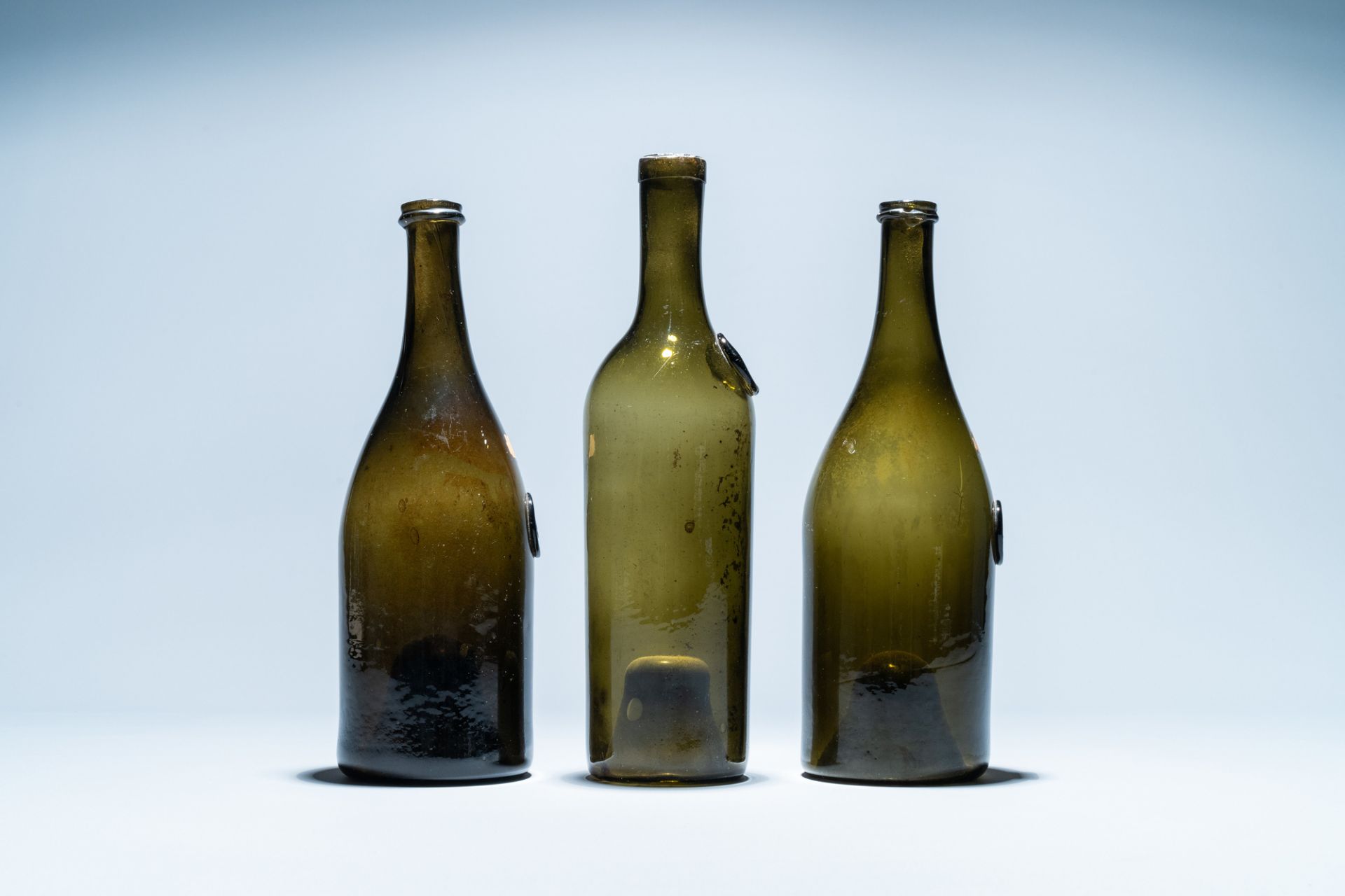 Three green glass wine bottles with crowned seals, 18/19th C. - Image 3 of 7