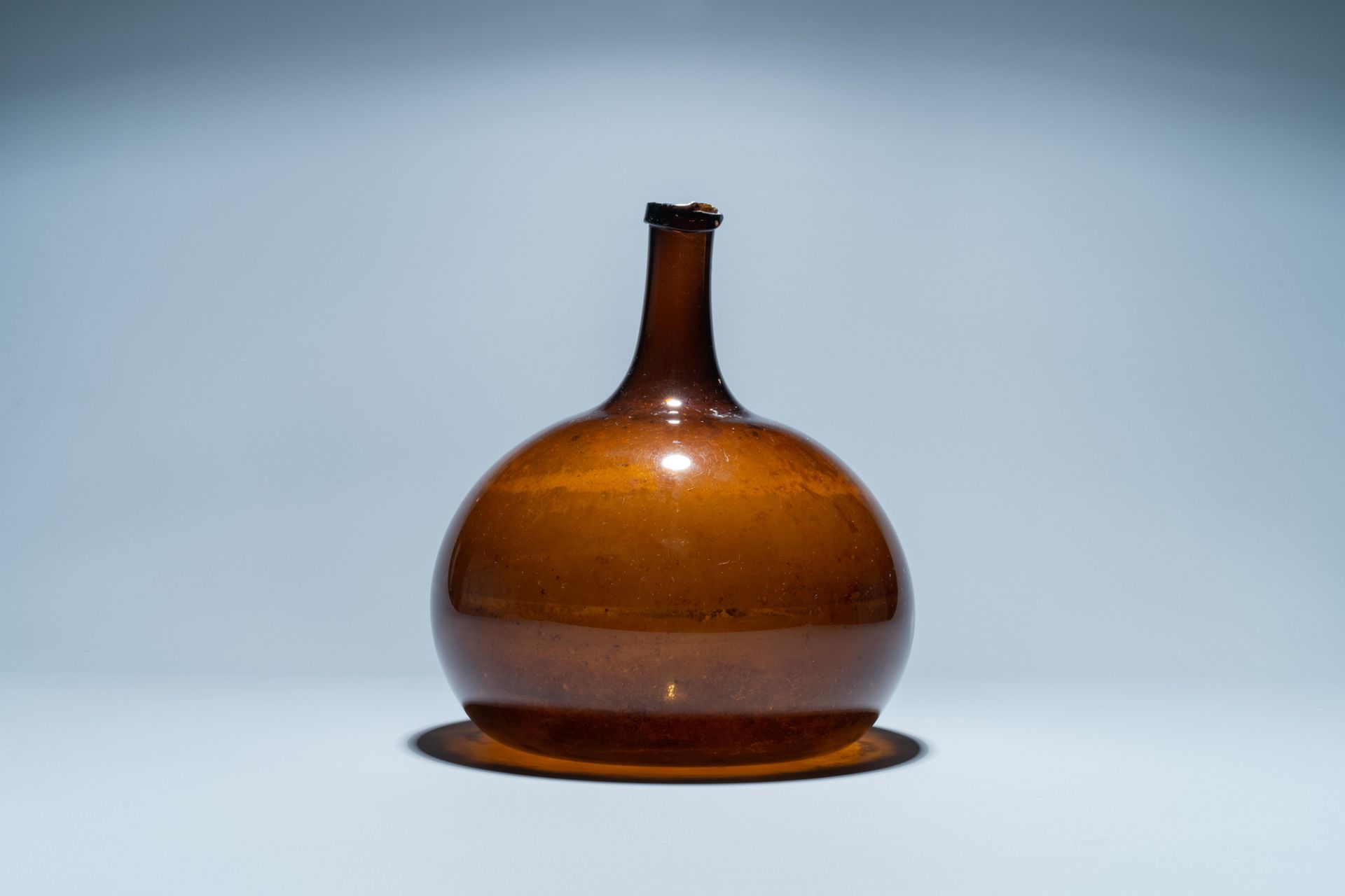 A brown glass bottle, 18th C. - Image 3 of 6