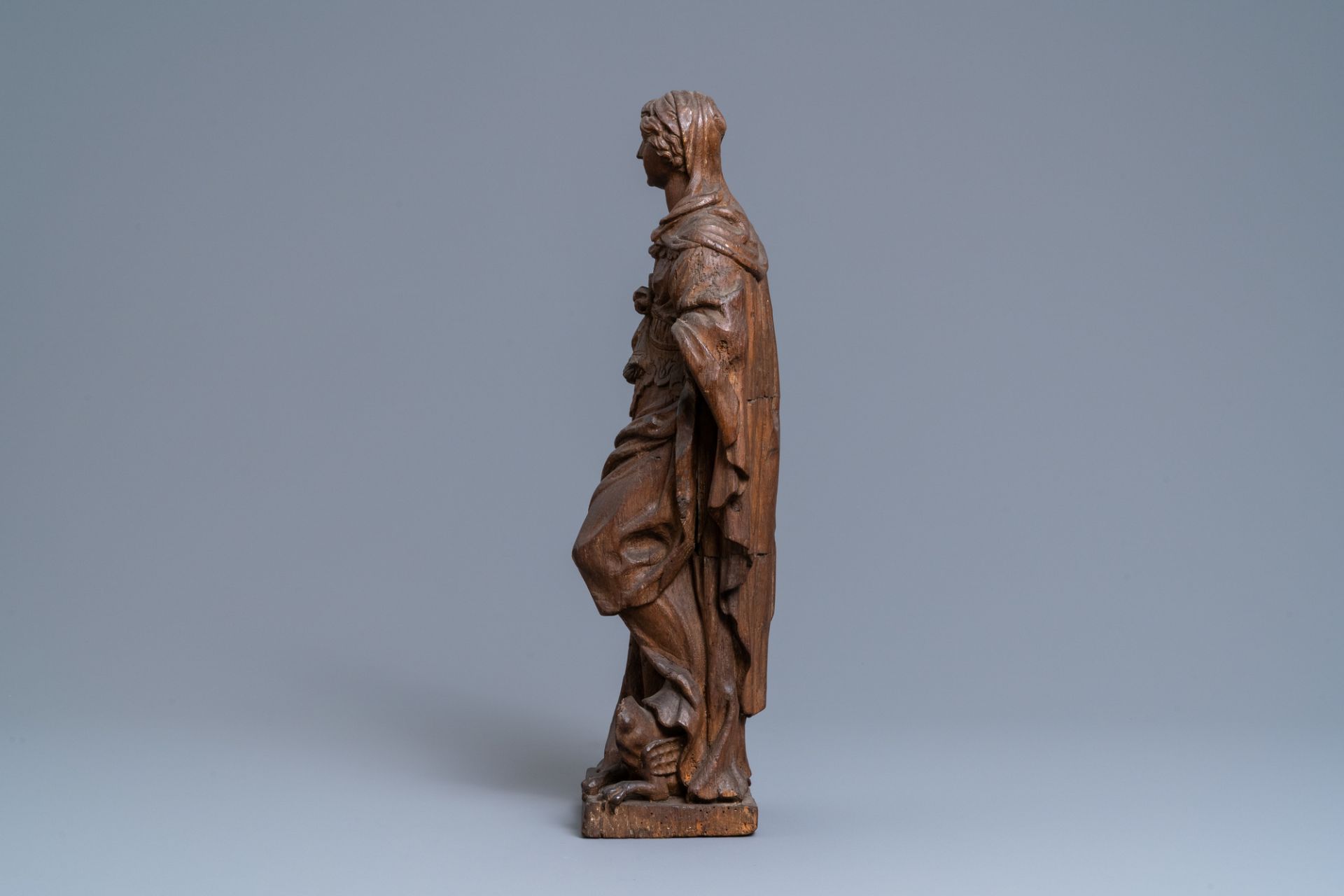 An oak figure of a female saint crushing a griffin, 2nd half 16th C. - Image 5 of 7