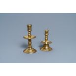 A Flemish bronze capstan candlestick and a disc candlestick, 16/17th C.