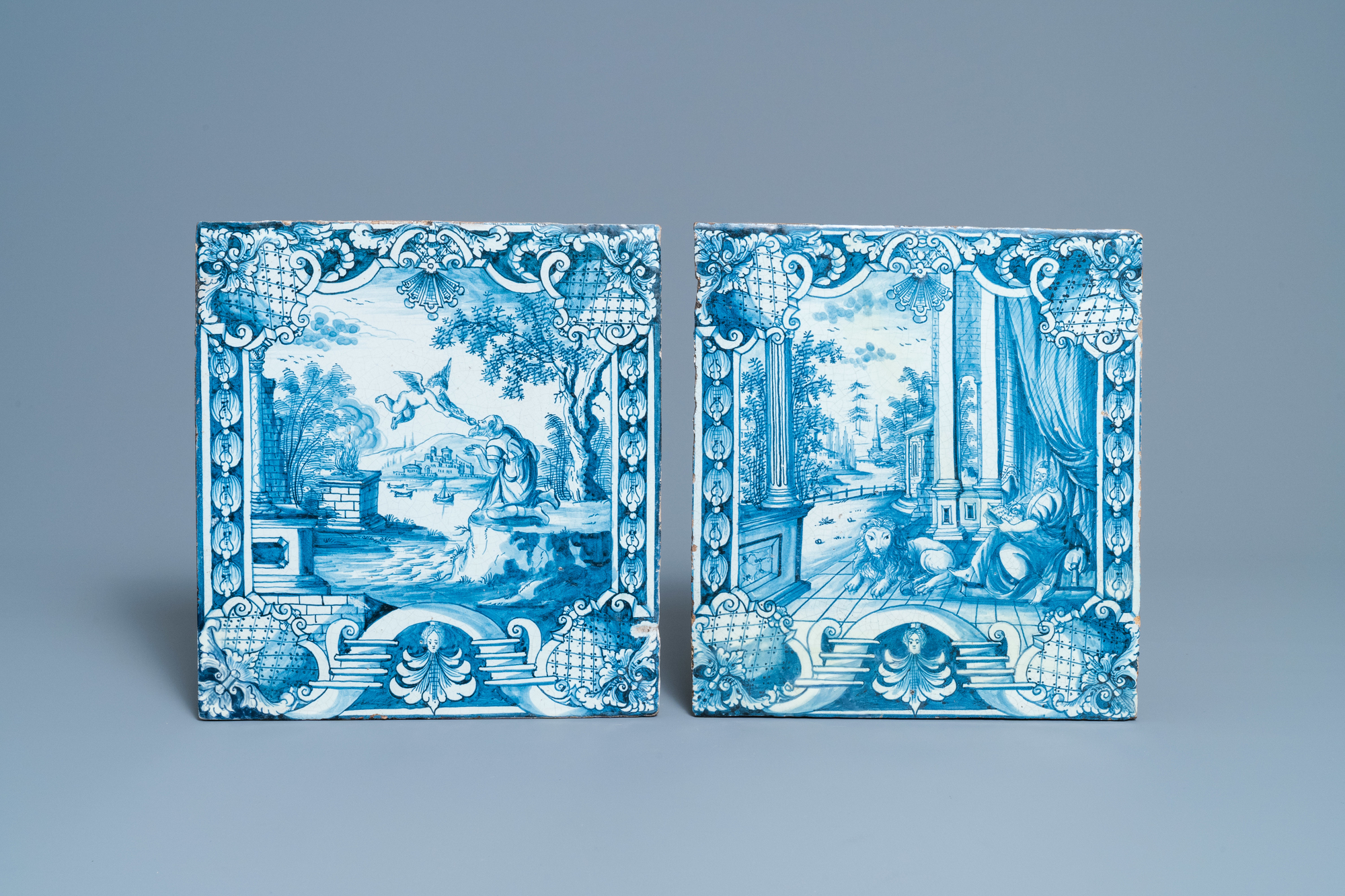 Two blue and white German stove tiles with biblical scenes, Nuremberg, 18th C.